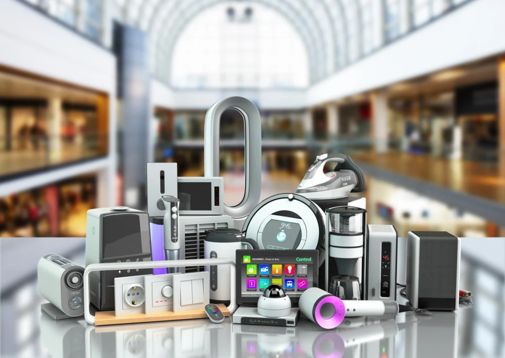 Collection of modern smart home appliances and devices on a reflective surface
